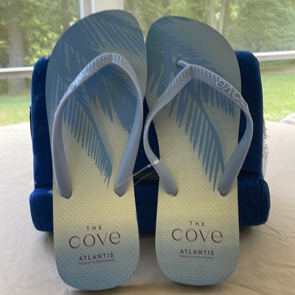 NWT periwinkle blue and white flip flops from The Cove at Atlantis